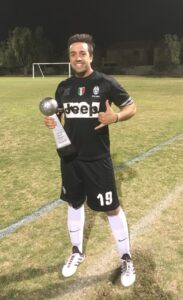 Boom City captain with championship trophy
